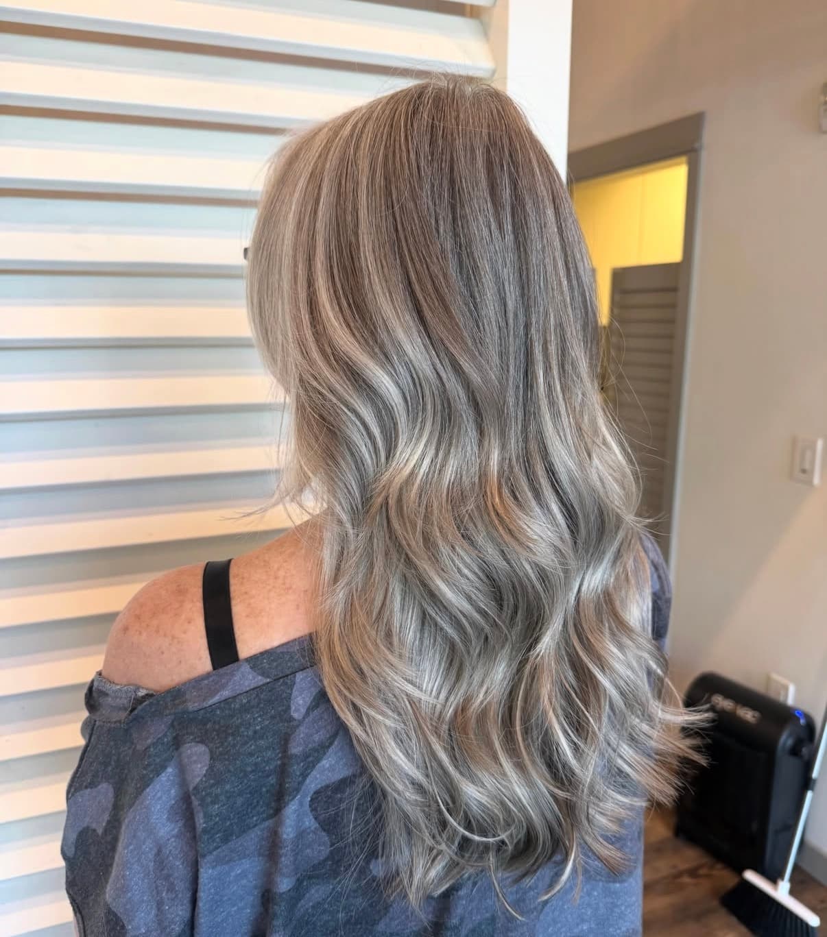 Long dimensional ash blonde waves by Courtney Morgan