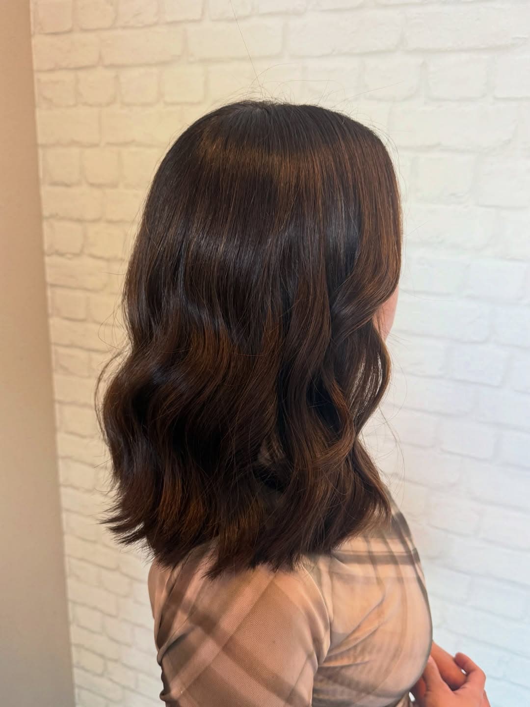 Short dimensional espresso brunette haircut by Courtney Morgan